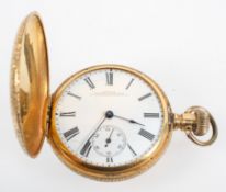 A yellow metal full hunter pocket watch.