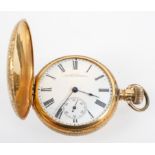 A yellow metal full hunter pocket watch.