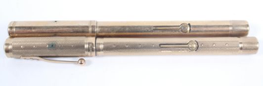A Waterman's 'Ideal' fountain pen with an engine turned 9ct gold case, London 1929,