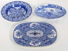 A Spode pearlware drainer, early 19th century, blue transfer printed with chinoiserie scenes,