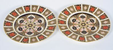 A pair of Derby Imari plates, 20th century, printed iron red marks, pattern No 1128,
