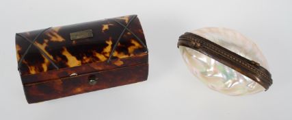 A tortoiseshell and metal inlaid domed box and cover, on ivory bun feet, 19th century,