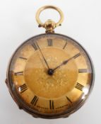 A yellow metal open face pocket watch.