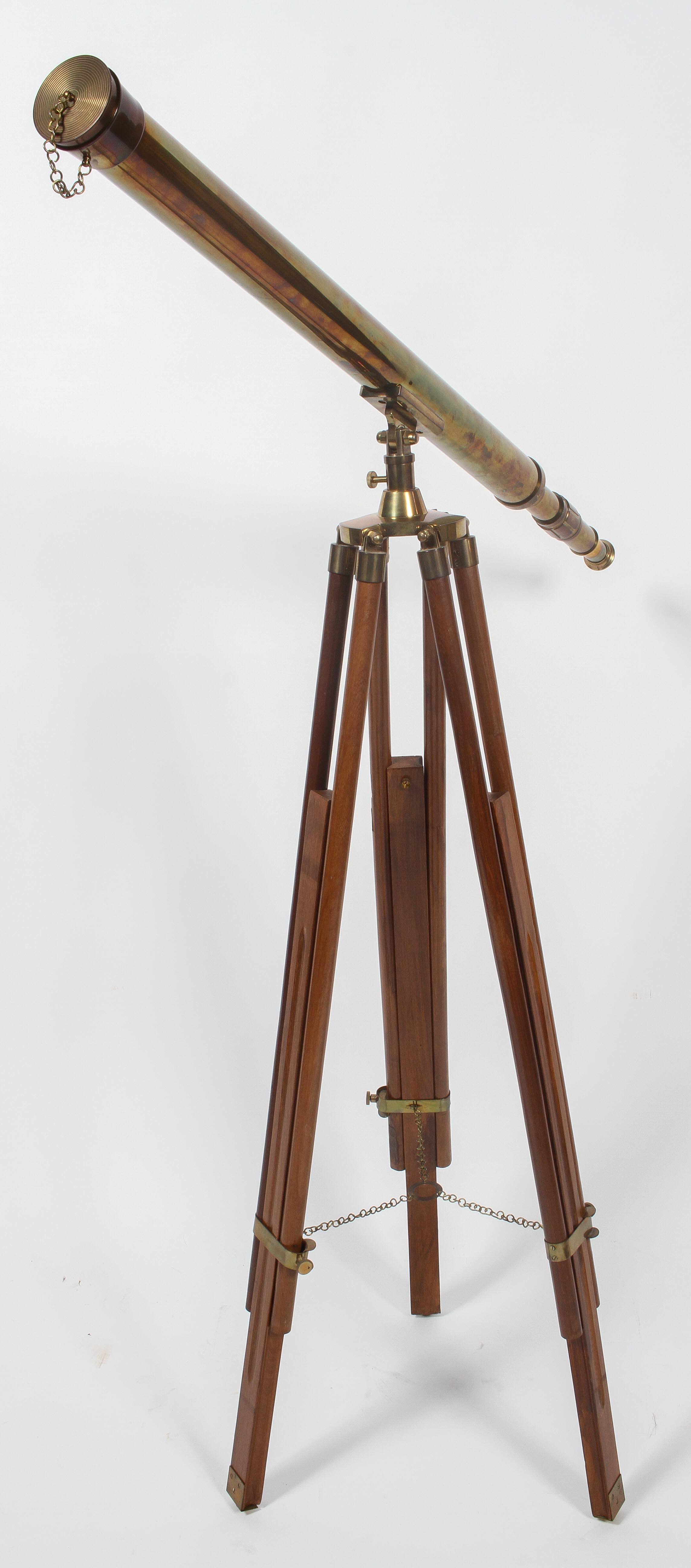 A 20th century three draw brass telescope, on wooden tripod stand, with chained dust cap,