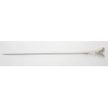A Continental white metal and steel hat pin with a plique a jour Egyptian revival motif,