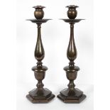 A pair of bronzed metal lamp bases, of 18th century form,
