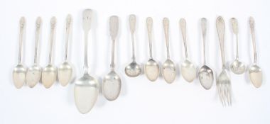 A silver fiddle pattern dessert spoon, London 1834, 17cm high; with a collection of tea spoons,