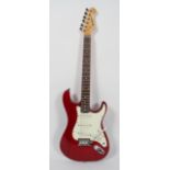 A Tanglewood 'Nevada FST-32K Lite' electric guitar, in red and cream, in a soft case,