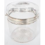 A silver mounted glass biscuit barrel, of plain cylindrical form, with a star cut cover and base,