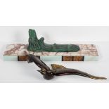 A French onyx marble mounted Art Deco style metal sculpture of a bird in flight, 20th century,