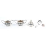 A small silver funnel, of very plain hemispherical form, stamped Sterling,