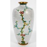A Japanese cloisonne vase, a prunus tree on a scrolling 'cloud' ground,