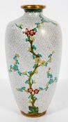 A Japanese cloisonne vase, a prunus tree on a scrolling 'cloud' ground,