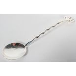 A silver Arts & Crafts style jam spoon, with wrythen stem, and pierced terminal, Birmingham 1902,