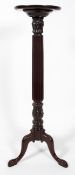 A George III style mahogany torchere, probably early 20th century,