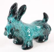 An Italian 1960's retro vintage pottery Scottish terrier, in a black and green glaze,