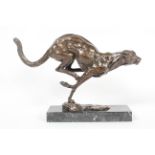 20th century school, Running cheetah, brown patinated bronze on a black marble base,