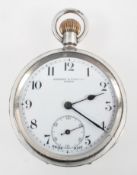 An open face pocket watch.