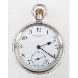 An open face pocket watch.