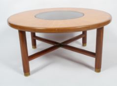 A G-plan 1970's glass mounted circular teak framed coffee table,