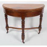 A Victorian mahogany folding games table, of D section,