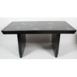 An Art Deco style black painted dining table,