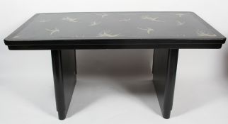 An Art Deco style black painted dining table,