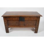 An oak coffer, 18th century and later, of rectangular form,