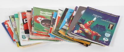 A group of approximately 70 football programmes, including a World Cup (Qualifying Round),