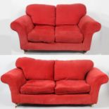 A velvet upholstered three seater club style sofa, with low back and curved arms,
