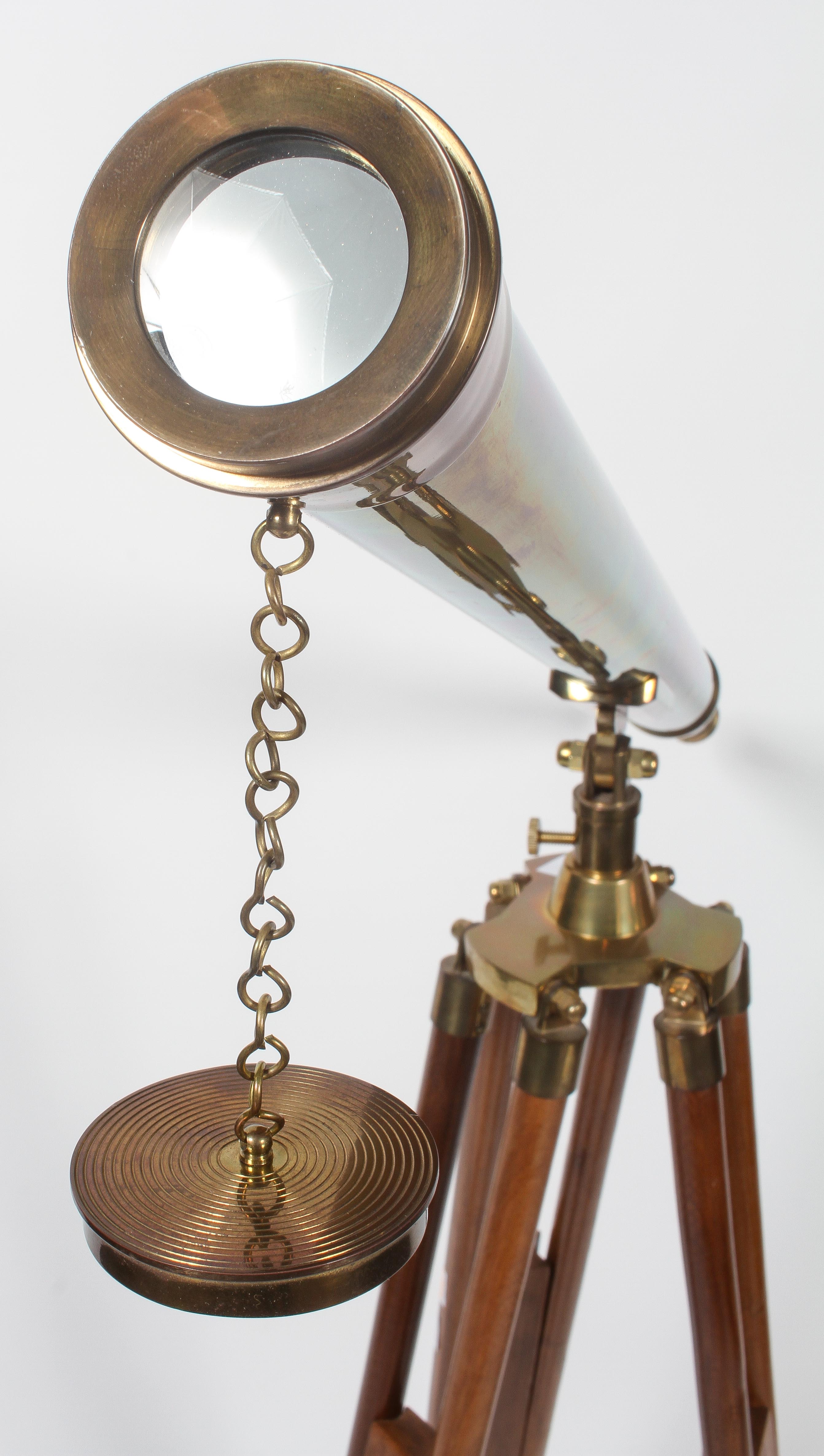 A 20th century three draw brass telescope, on wooden tripod stand, with chained dust cap, - Image 2 of 2