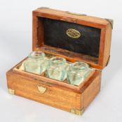 A camphour wood and brass bound medicine box for G B Brown Hoomeopathic Pharmacy,