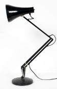 An angelpoise lamp, black painted,