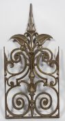 A cast iron decorative screen with cresting of C and S scroll motifs, foliates and spear heads,