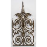 A cast iron decorative screen with cresting of C and S scroll motifs, foliates and spear heads,