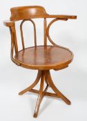 A Victorian oak inlaid swivel desk chair, late 19th century,