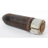 A World War II period tank shell,