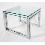A nest of glass and chrome occasional tables, circa 1970, of rectangular form,
