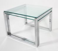 A nest of glass and chrome occasional tables, circa 1970, of rectangular form,