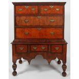 A George I walnut and mahogany veneered chest on stand, early 18th century,