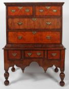 A George I walnut and mahogany veneered chest on stand, early 18th century,