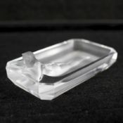 A Lalique style dish, cast with a nude lady resting on the side,