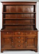 A George III oak kitchen dresser,