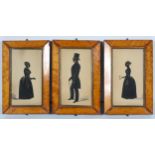 Three 19th century framed silhouettes, two ladies and a gentleman, in birds eye maple frames,