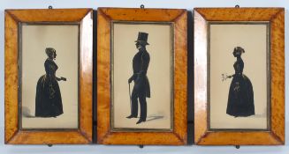 Three 19th century framed silhouettes, two ladies and a gentleman, in birds eye maple frames,