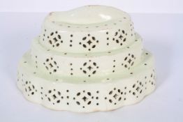 An English creamware stepped curved cheese mould, late 18th century,