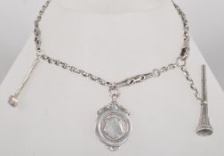 A silver watch chain having an attached seal (stone missing), shield pendant & hammer charm.