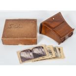 A wooden Stereoscope viewer, of slightly flaring form, and a collection of 30 slides,