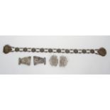 An EPNS belt with foliate and figural decoration, 62cm long,