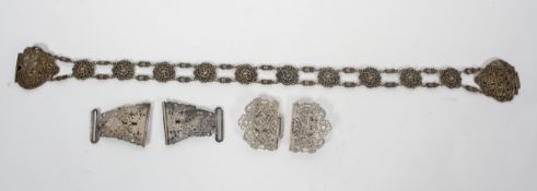 An EPNS belt with foliate and figural decoration, 62cm long,